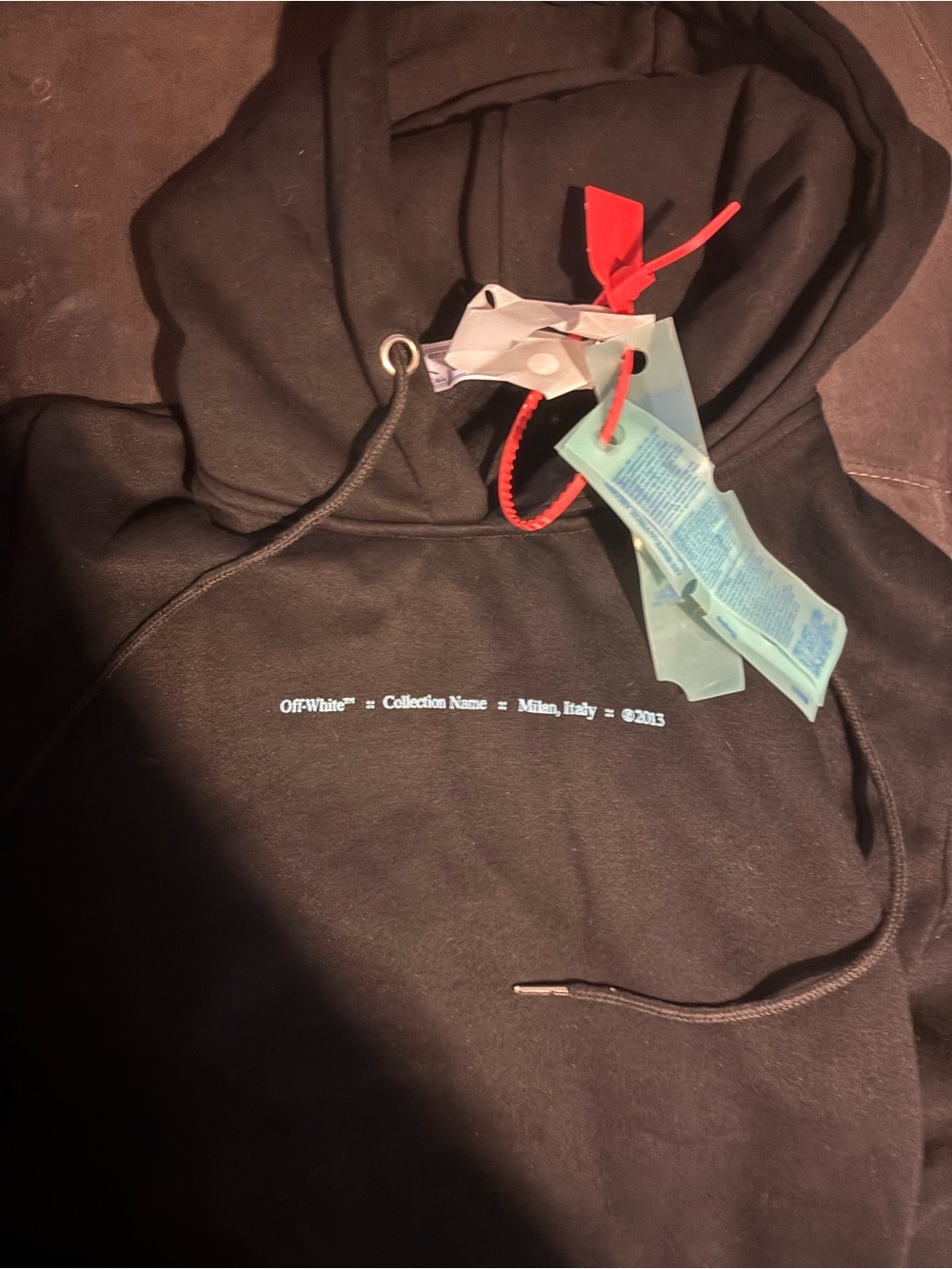 Off-White Black Hoodie with White Text and Red Tag